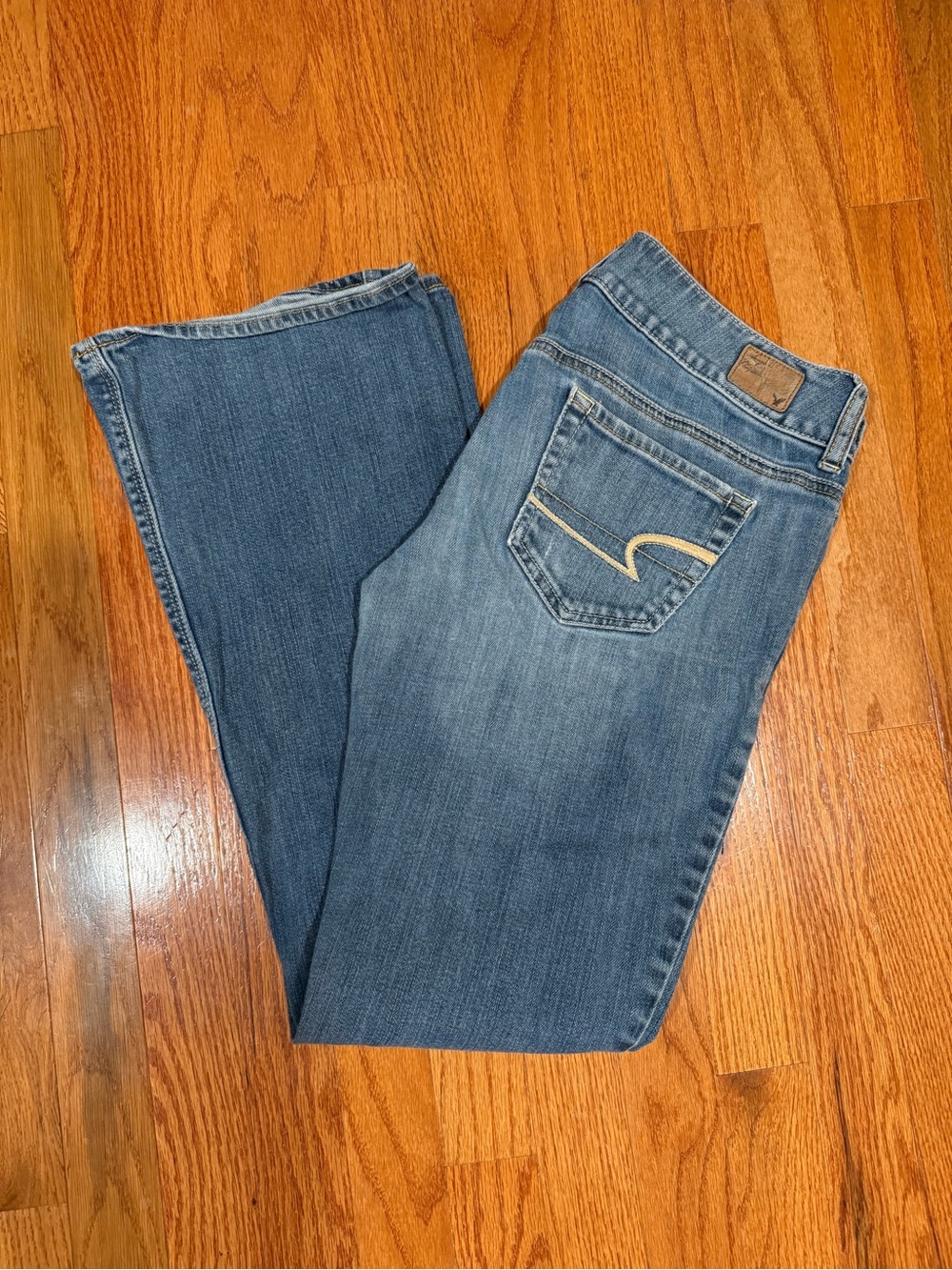 American Eagle Outfitters Blue Boot Cut Jeans with Curved Pocket Stitch